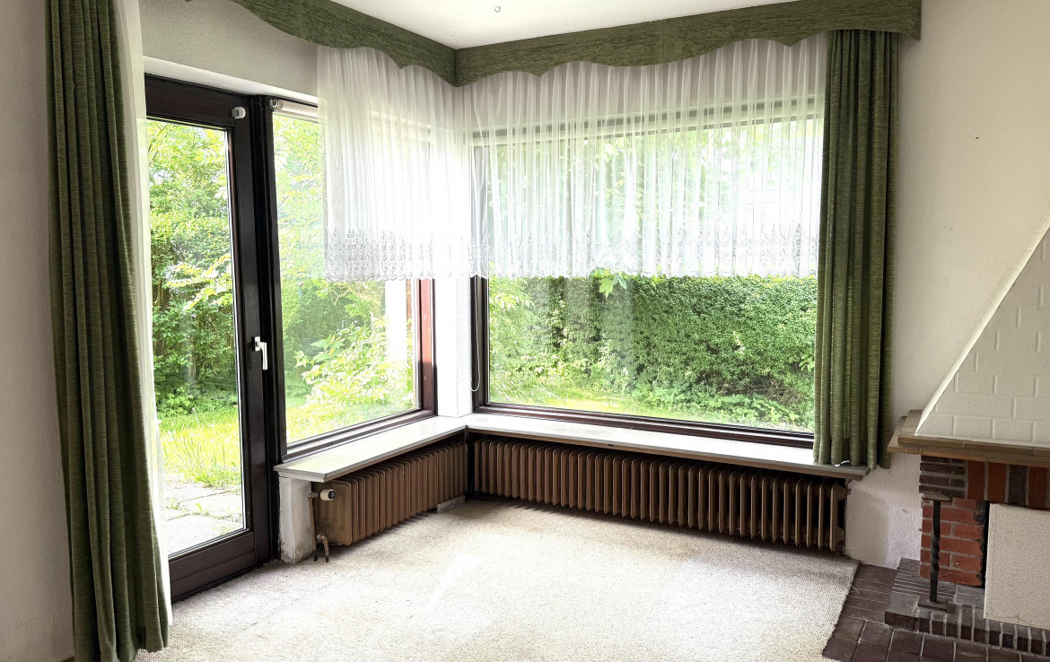 Wohnbereich mit Zugang zur Terrasse