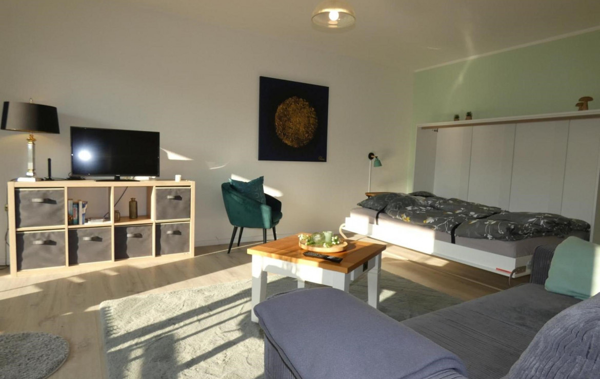 Wohnbereich mit integriertem Bett